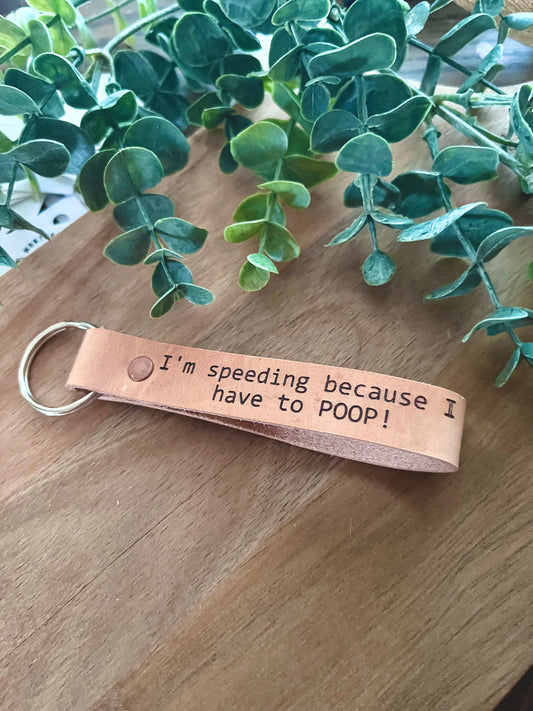 I’m speeding because I have to poop - Genuine Leather Keychain
